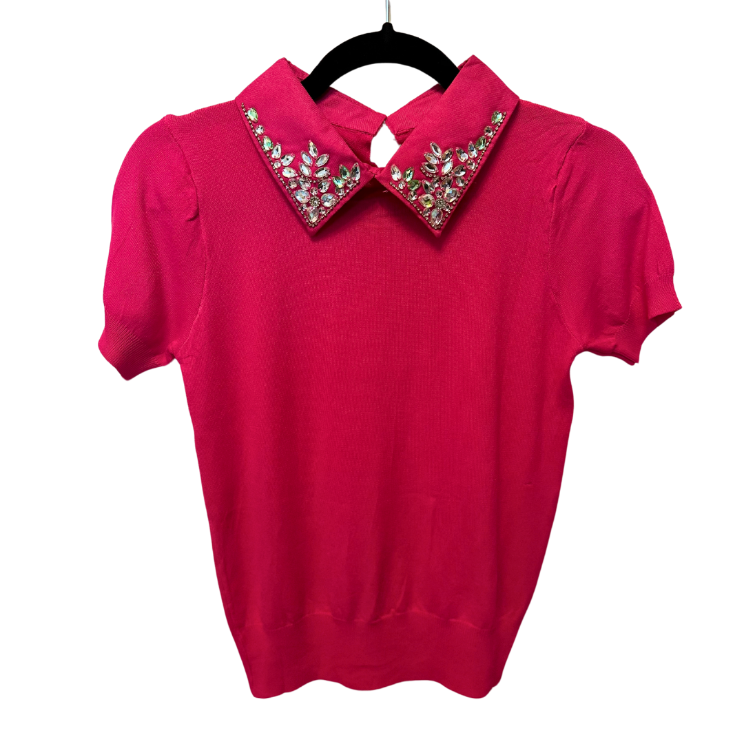 Blusa tipo polo con aplicaciones en cuello